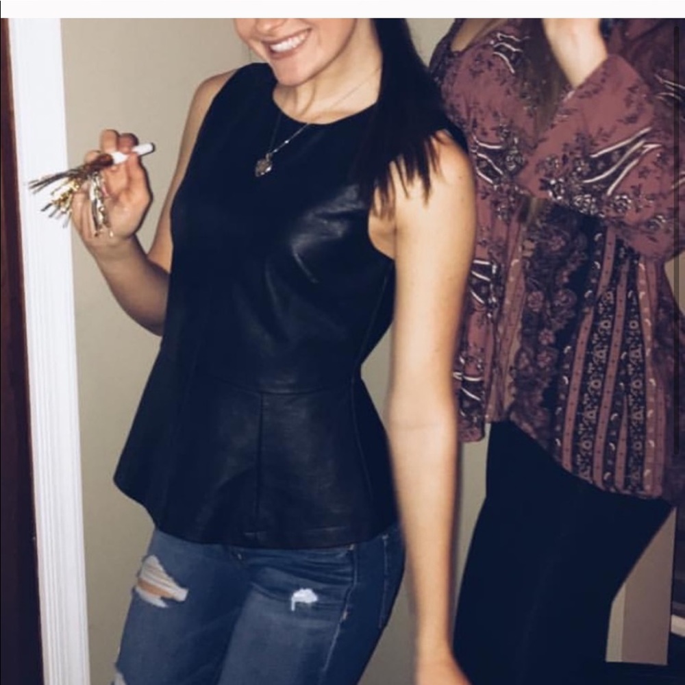 Faux leather peplum top
